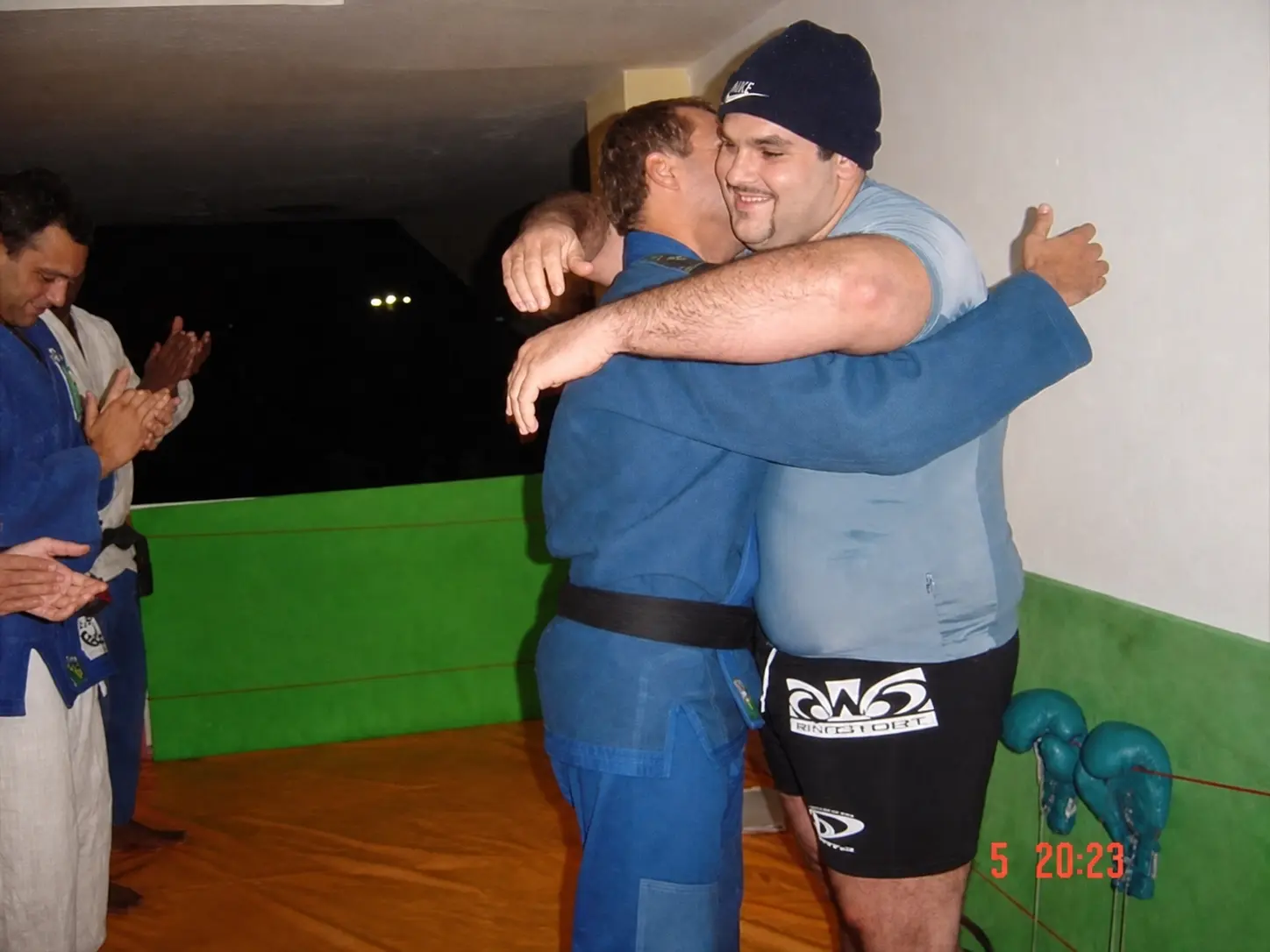 Fabiano embracing his instructor Otavio 'Tata' Duarte after receiving his black belt